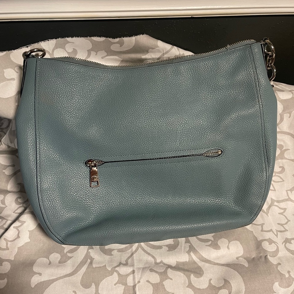 Light Blue large COACH bag.